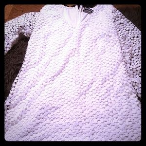 A short long sleeve white dress